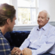 Son Speaking with Senior Parent