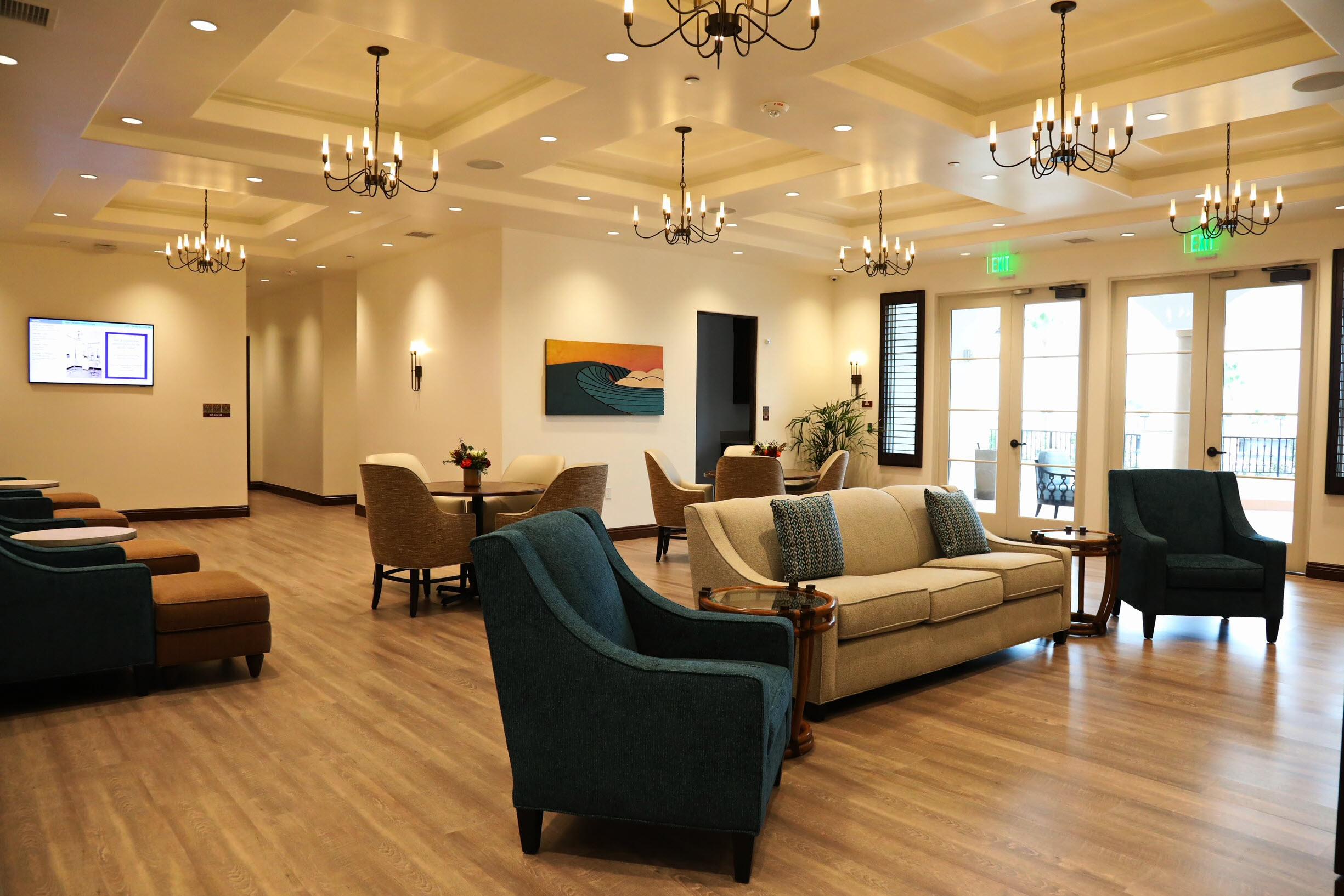 Comfortable shared living and gathering space at Raya’s Paradise Memory Care community in San Clemente, Orange County